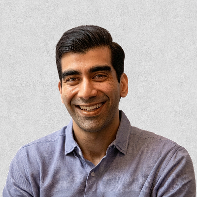 Team headshot example 1, subject placed on light textured background